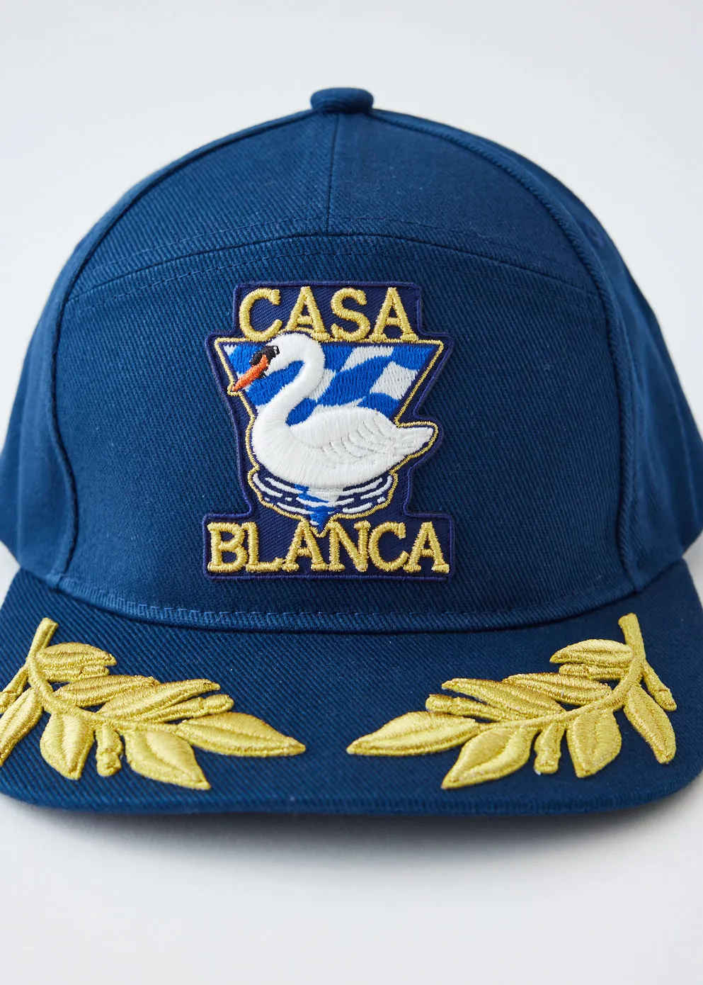Par Avion Laurel Cap