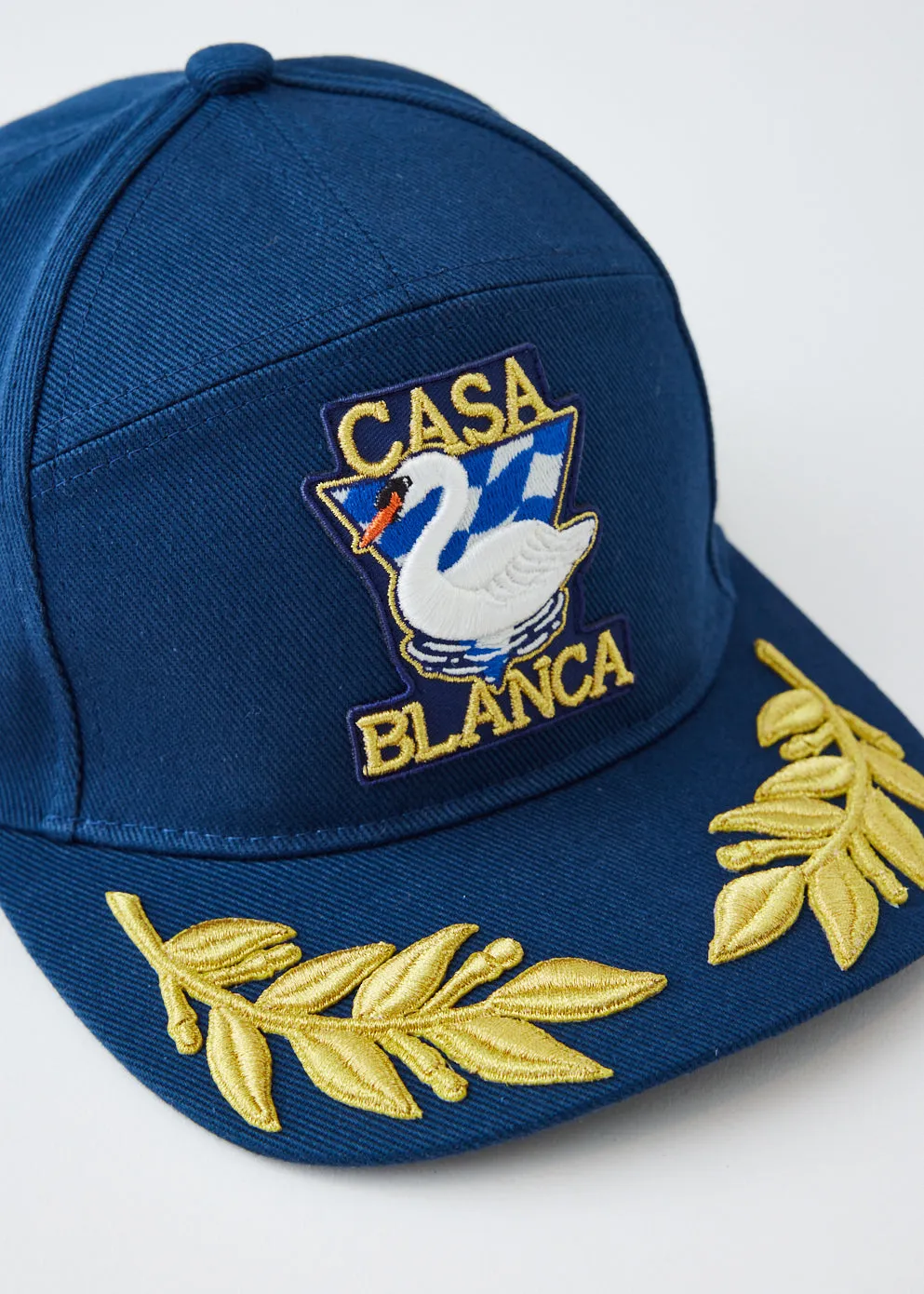 Par Avion Laurel Cap